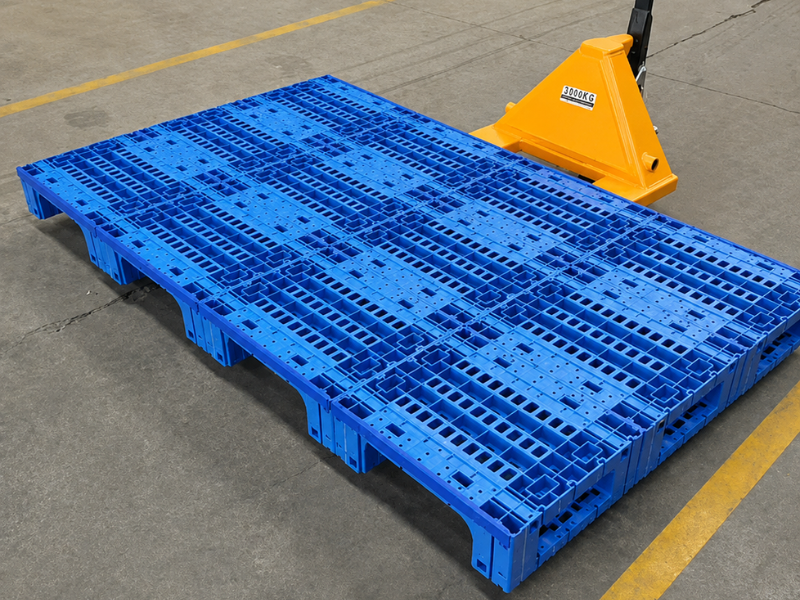 Spliced plastic pallets are transported by forklift